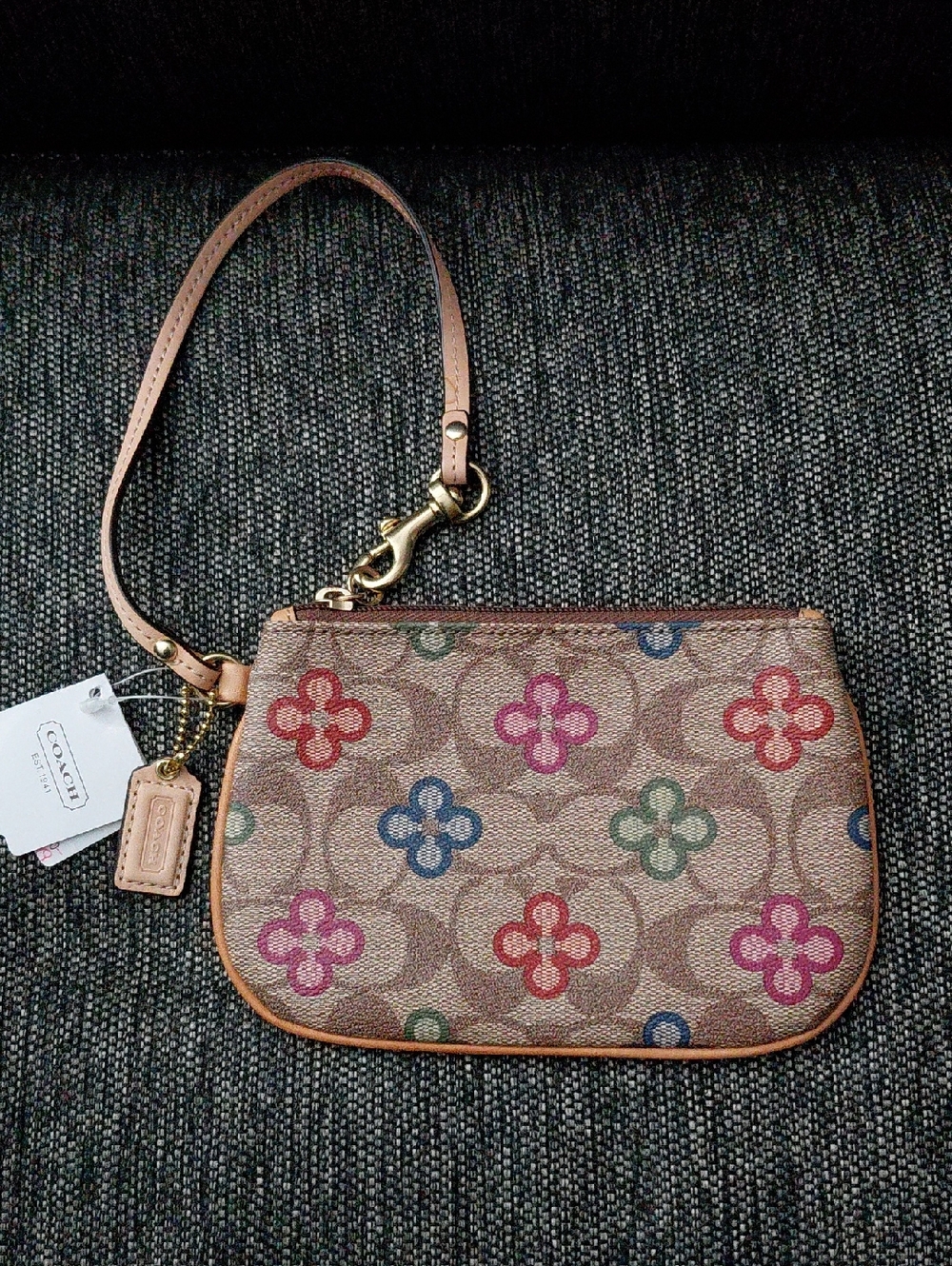 Coach Floral Pattern Wristlet with Tan Strap